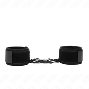 Black neoprene wrist support with buckles and straps, adjustable from 22 to 34 cm