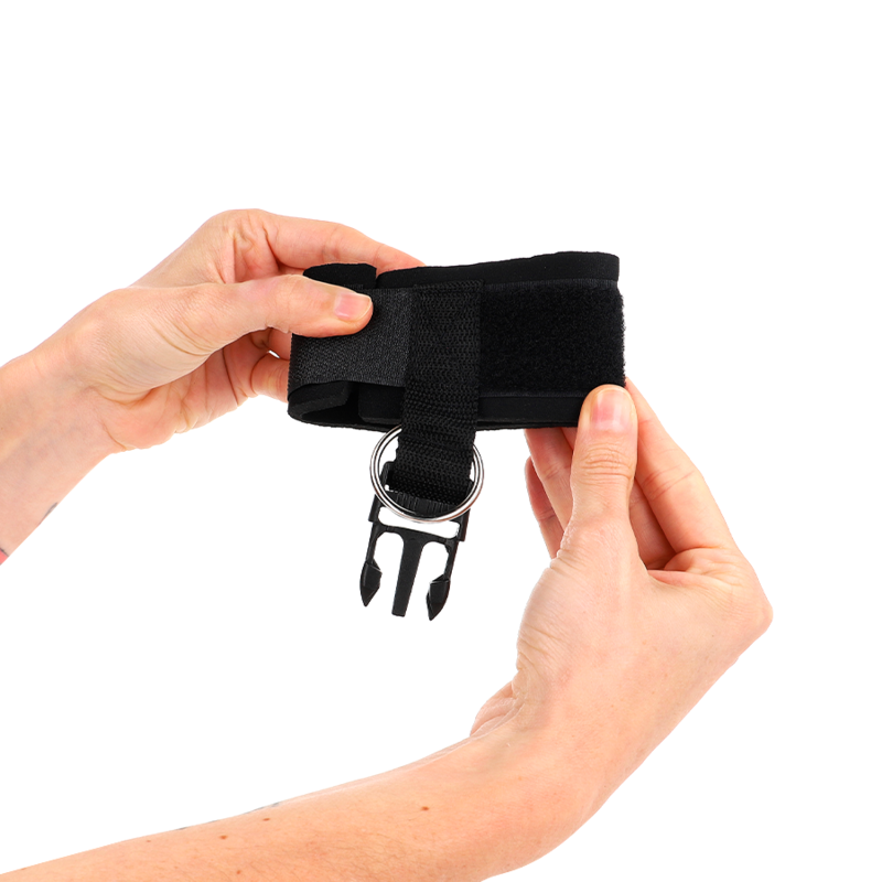 Black neoprene wrist support with buckles and straps, adjustable from 22 to 34 cm